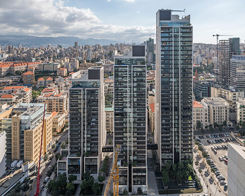 '3beirut' by foster + partners is a limestone-clad residential development in lebanon