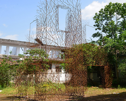 V studio's boston ivy-covered artwork preserves the memory of old shanty towns in china