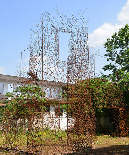 V studio's boston ivy-covered artwork preserves the memory of old shanty towns in china