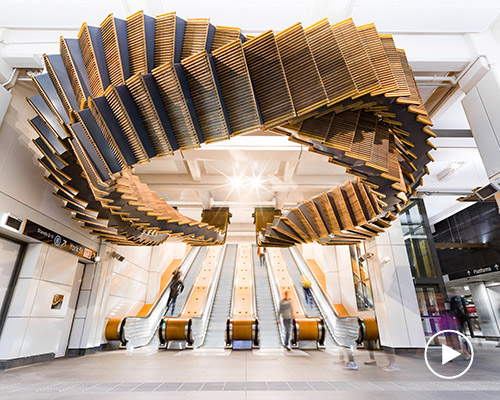 80-year old wooden escalators form mind-warping sculpture in 'interloop' by chris fox