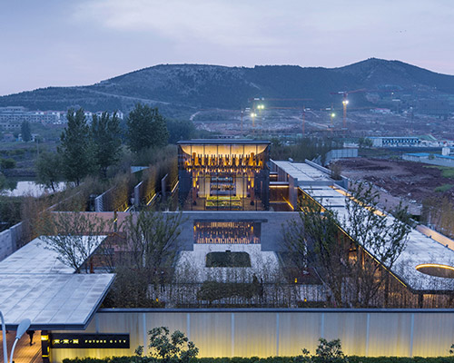 traditional chinese craftsmanship inspires exhibition space by continuation studio