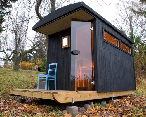 denizen works’ tiny mobile sauna tows onto the frozen scandinavian shores