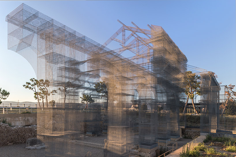 Artist Edoardo Tresoldi builds ghostly ruins inside Paris' Le Bon