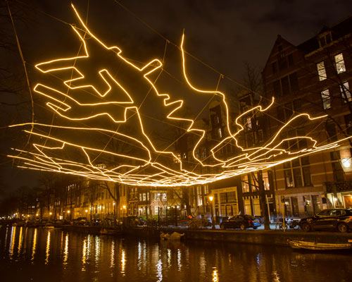 all seeing eyes, wormholes, and slime molds at amsterdam's 'existential' festival of lights