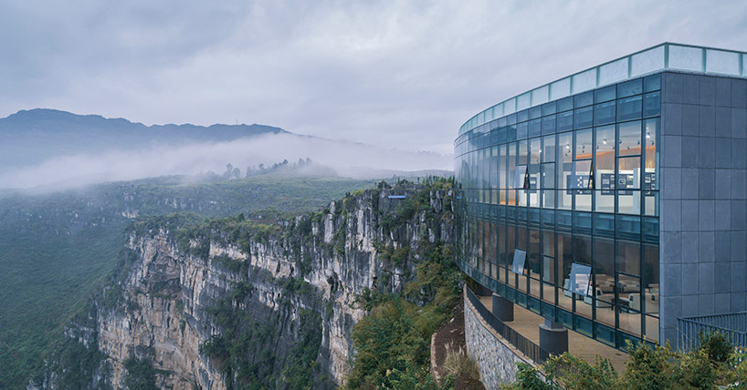 on a cliff face limestone gallery nestles into shangri-la's haiwei canyon