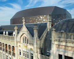 simpsonhaugh weaves bronze mesh ceiling through queen elisabeth concert hall in antwerp