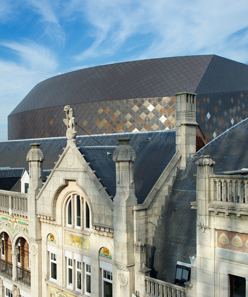 simpsonhaugh weaves bronze mesh ceiling through queen elisabeth concert hall in antwerp