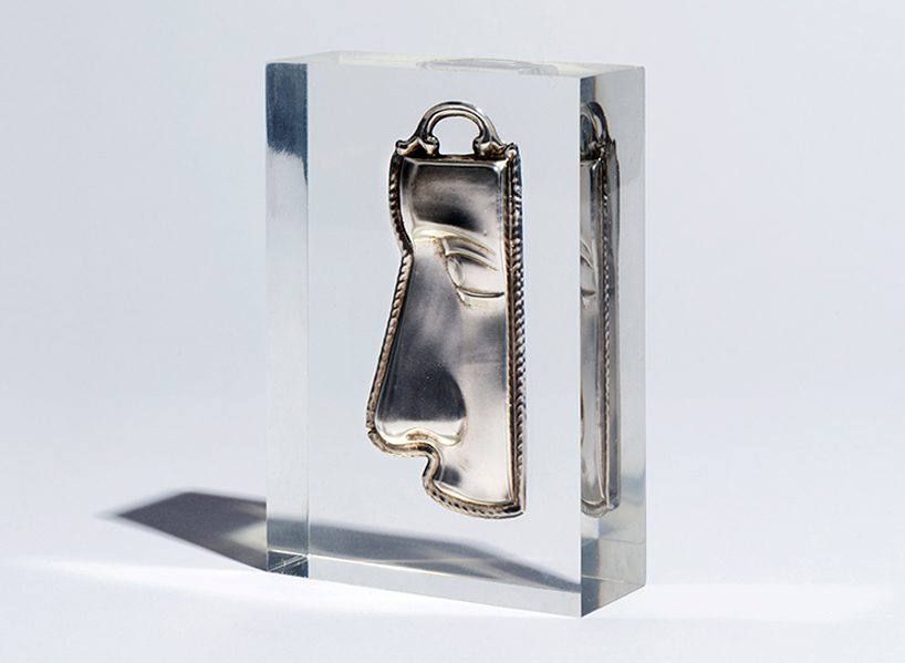 studio nucleo melds antique ex-voto souvenirs in resin