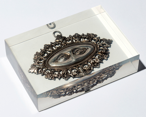 studio nucleo melds antique ex-voto souvenirs in resin