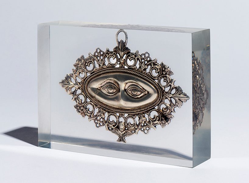 studio nucleo melds antique ex-voto souvenirs in resin