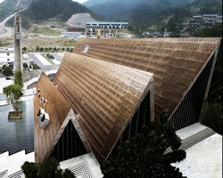west-line studio's triangular-shaped cultural center in china pays homage to shui people