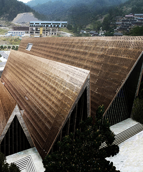 west-line studio's triangular-shaped cultural center in china pays homage to shui people