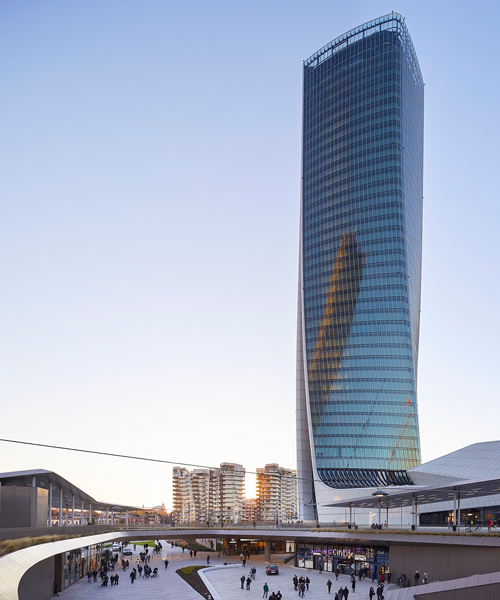 shopping complex by zaha hadid architects opens at the foot of milan's generali tower