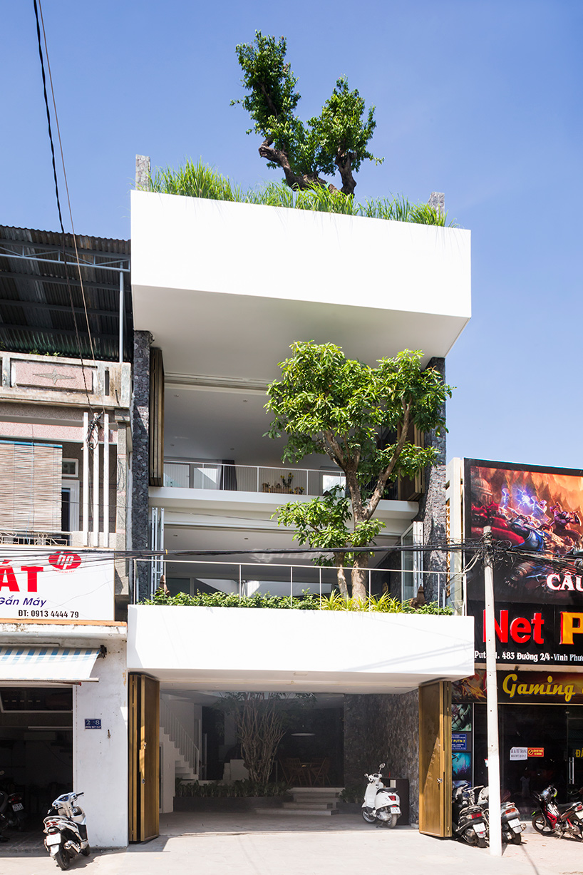 MW archstudio completes narrow '204 house' in nha trang, vietnam