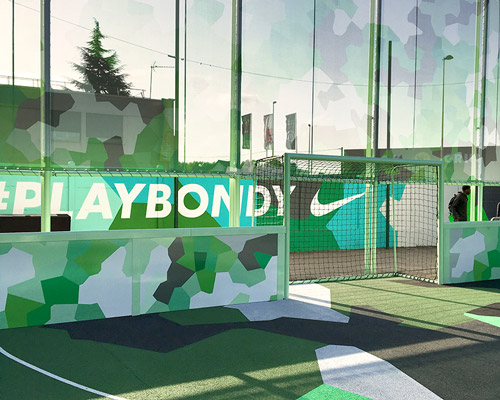 laisné roussel and midori hasuike renovate football pitch for NIKE in the suburbs of paris