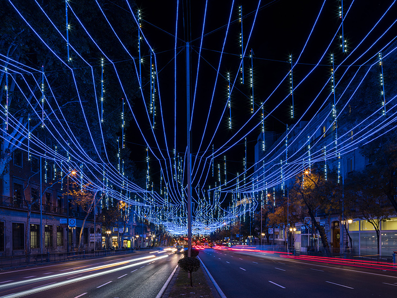 'stellar' light installation by brut deluxe zigzags above a madrid street