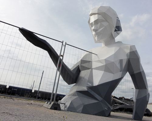 david mesguich presents sculpted woman amidst riots in nantes, france