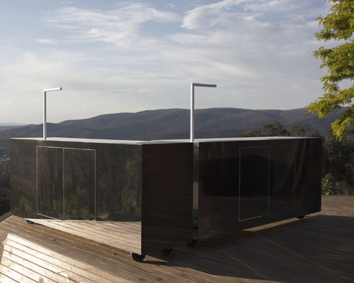 edwards moore creates mirror mobile bars that adapt to their surroundings like chameleons
