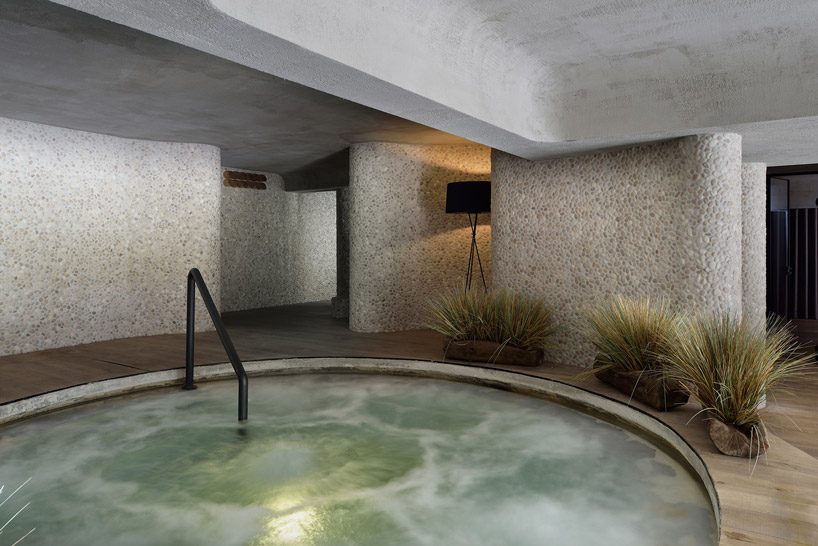 enota architects sets slovenian wellness hotel in 'europe's most beautiful valley'