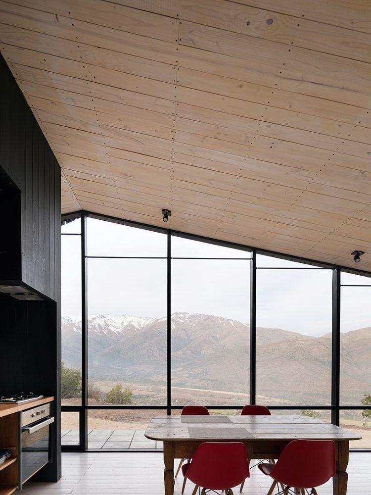 gonzalo iturriaga arquitectos folds roof into angled entrance in chile