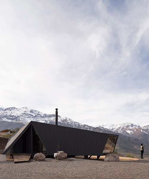 gonzalo iturriaga arquitectos folds roof into angled entrance in chile's mountaineer refuge