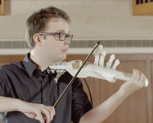 three UT students spent a year designing and 3D printing a six string violin