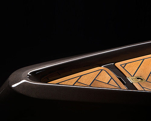 monocoque paddle canoe is crafted of copper-woven carbon fiber + classic teak wood
