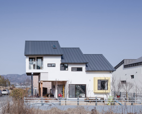 KDDH designs a house within a small lot in korea using a skip floor plan layout
