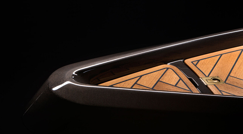 monocoque paddle canoe is crafted of copper-woven carbon