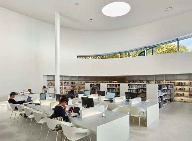 dominique coulon's flowing-shaped media library in france houses two cultural programs