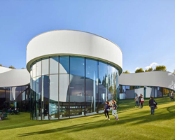 dominique coulon's flowing-shaped media library in france houses two cultural programs