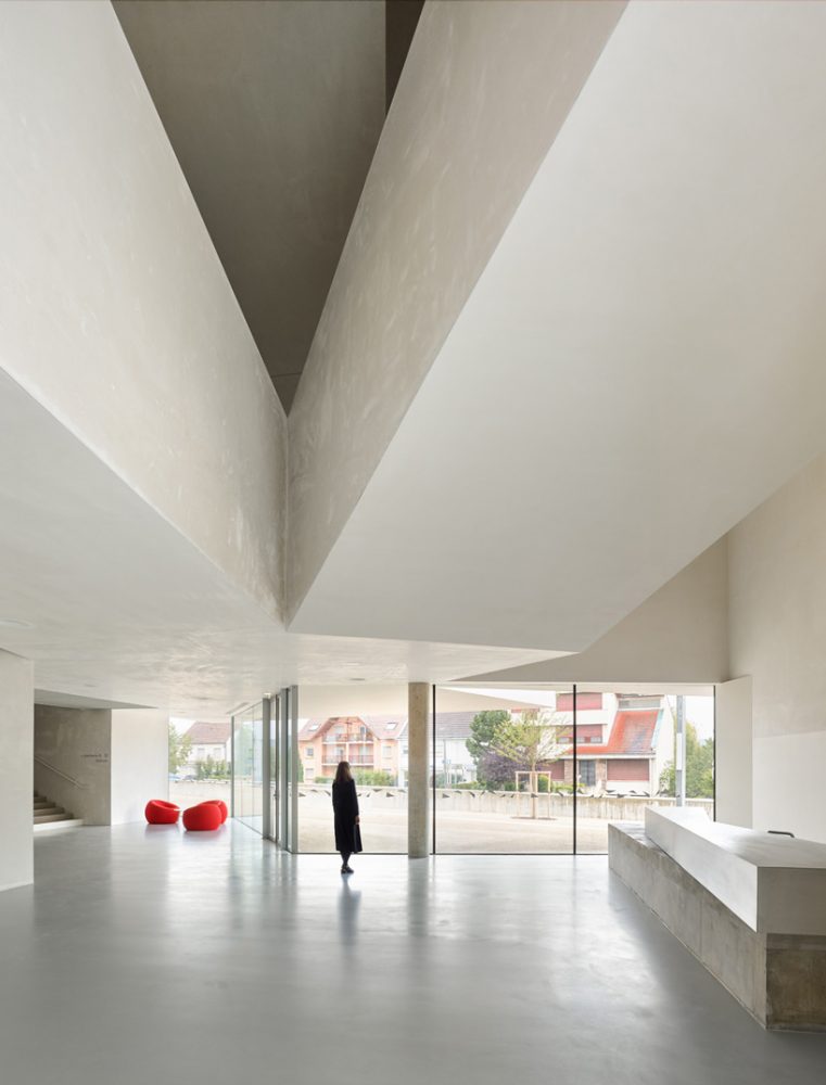 dominique coulon's white volume-stacked theater in france becomes a symbol of the city