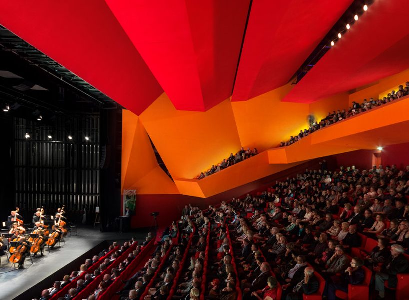 dominique coulon's white volume-stacked theater in france becomes a symbol of the city