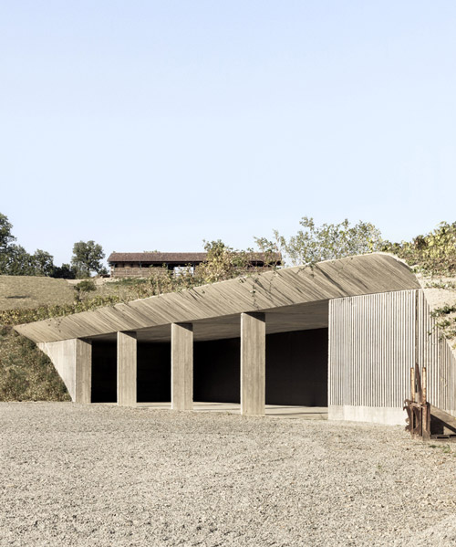 a discrete concrete injection into the agricultural landscape by de amicis architetti