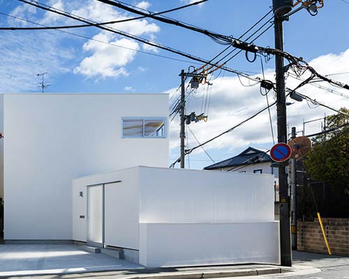 a private courtyard in kawanishi, japan brings light and privacy, by nLDK