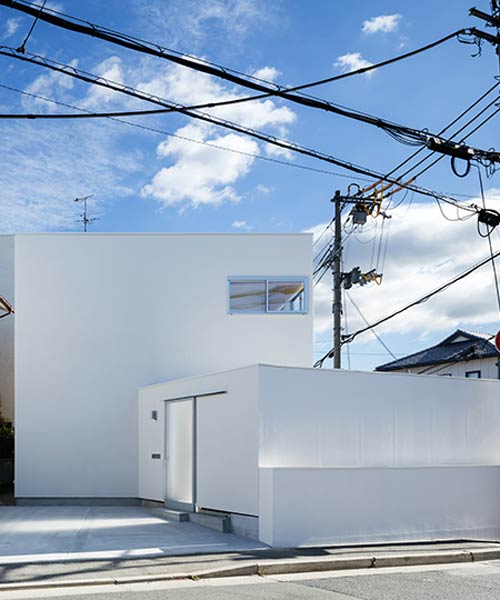 a private courtyard in kawanishi, japan brings light and privacy, by nLDK