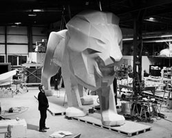 peugeot reveals monumental lion sculpture at geneva motor show 2018