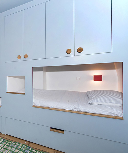 pierre-louis gerlier + marion duclos design meshes for sleeping in a bookcase