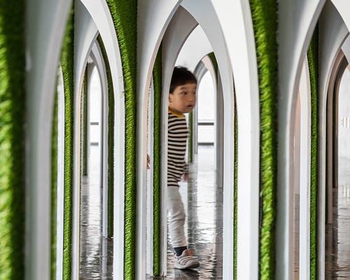 plain works + critical mass lab's arch forest installation is a surreal fairytale arched maze