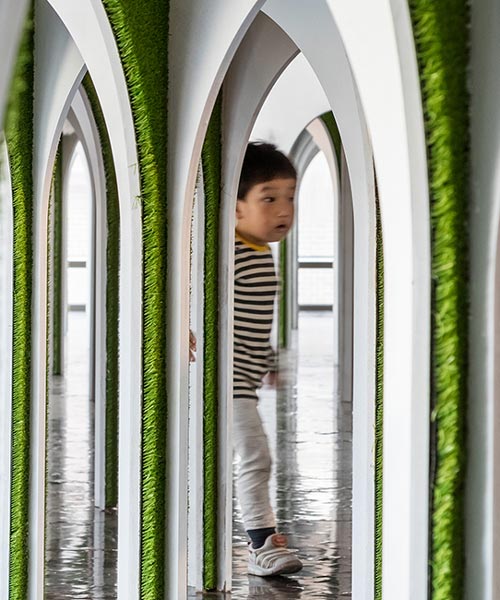 plain works + critical mass lab's arch forest installation is a surreal fairytale arched maze