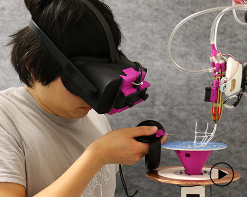 design in 3D augmented reality and this robotic arm physically prototypes it