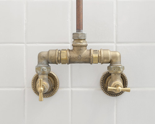 shaker-inspired copper framework creates musical score in this parisian studio