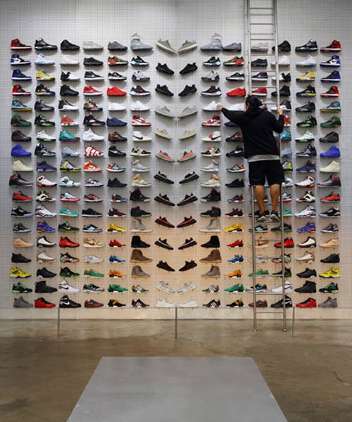 flight club store in LA is devoid of anything except product display and a bench, by slade architecture