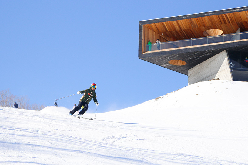 META-project's ski slope observatory frames vistas of a picturesque chinese landscape