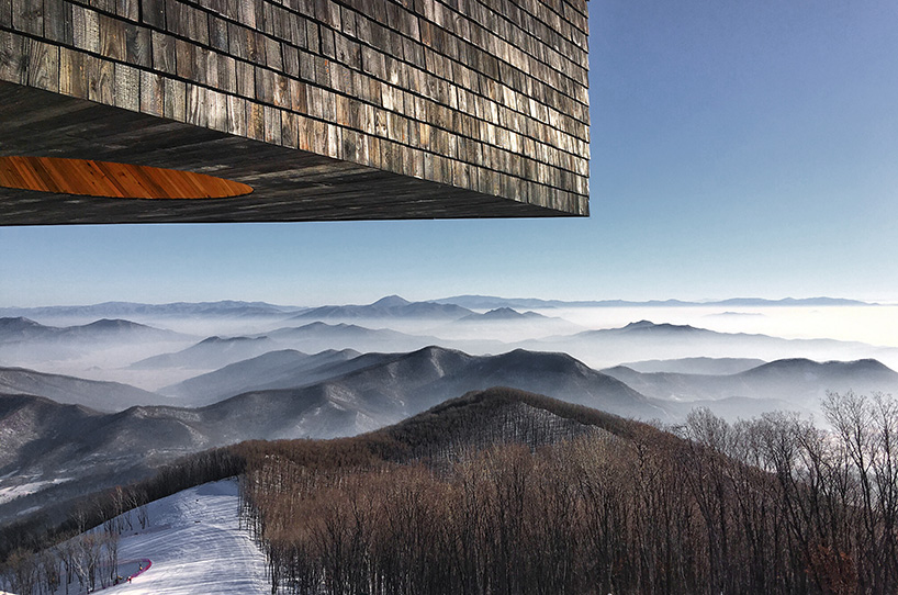META-project's ski slope observatory frames vistas of a picturesque chinese landscape