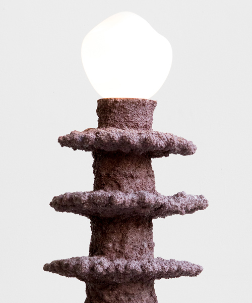 susan for susan sculpts stalactite-like lighting and otherworldly objects from cement + sand