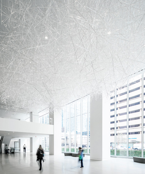 tokujin yoshioka's uses thousands of rods to create prismatic cloud in houston's allen centre
