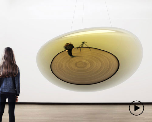 vincent leroy's UFO installation is a weightless drop naturally floating in the air