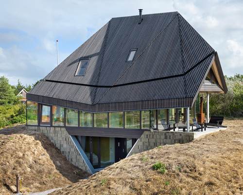 BSA's vlieland house responds to the island's dune landscape and strong winds