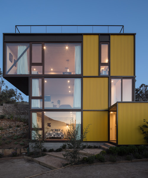 this geometric yellow house fits into the chilean landscape like a tetris piece